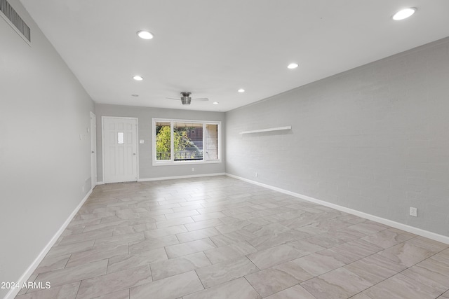 empty room featuring ceiling fan