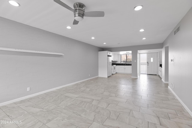 4701 N 68th St Unit 248, Scottsdale, AZ 85251 - unfurnished living room featuring recessed lighting, a ceiling fan, and baseboards
