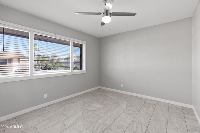 4701 N 68th St Unit 248, Scottsdale, AZ 85251 - unfurnished room with baseboards and ceiling fan