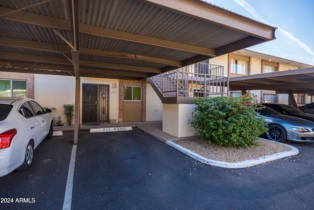 view of car parking featuring a carport