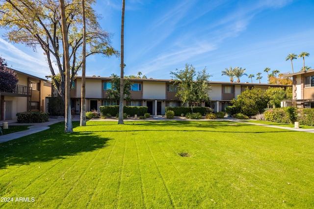 4701 N 68th St Unit 248, Scottsdale, AZ 85251 - view of front of house with stucco siding and a front yard