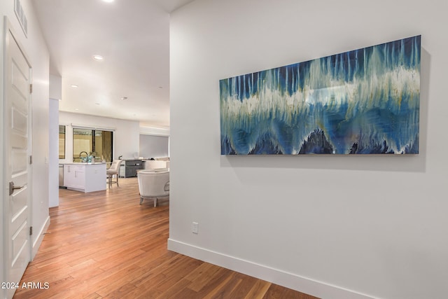 hall featuring light hardwood / wood-style flooring