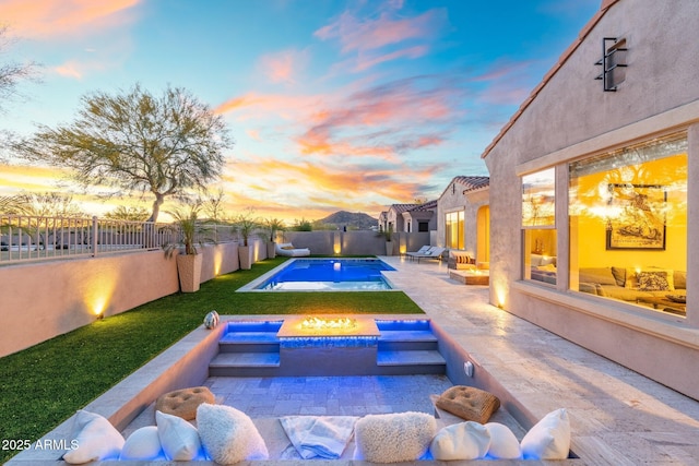 12428 S 179th Ln, Goodyear, AZ 85338 - view of swimming pool with a fenced backyard, a patio area, a jacuzzi, and a fenced in pool