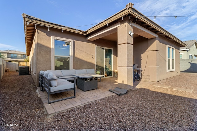 back of house with a patio area, central AC, and an outdoor hangout area