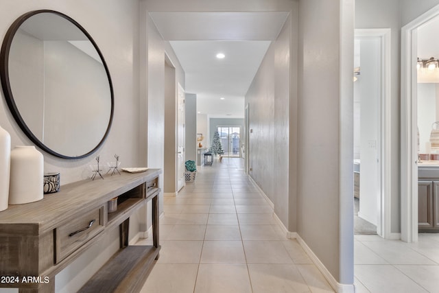 hallway with light tile patterned flooring