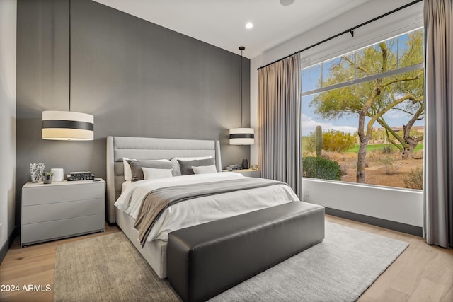 bedroom featuring light hardwood / wood-style flooring