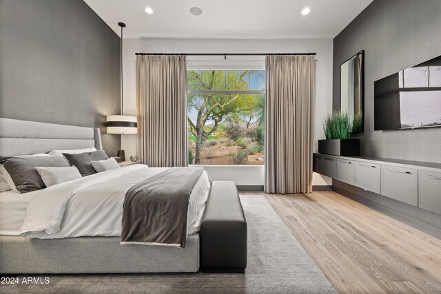 bedroom featuring light hardwood / wood-style floors