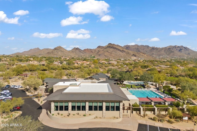 birds eye view of property featuring a mountain view