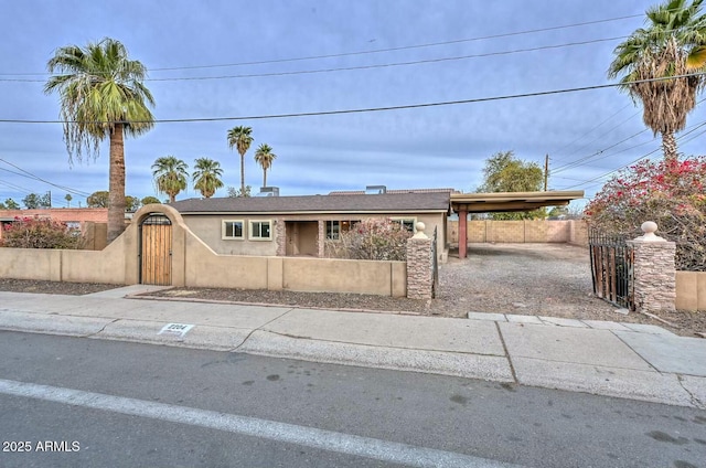 view of front of house with a carport