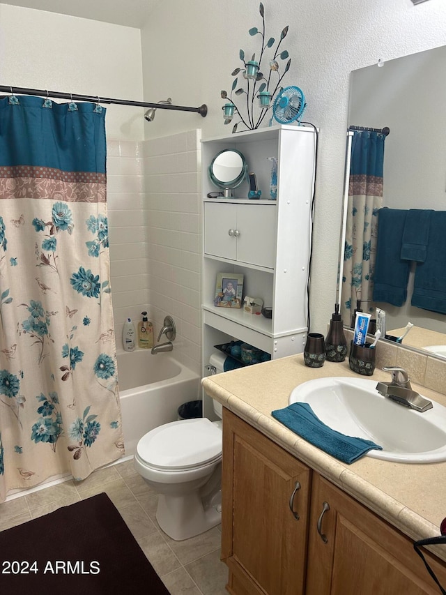 full bathroom with vanity, toilet, shower / bath combination with curtain, and tile patterned floors