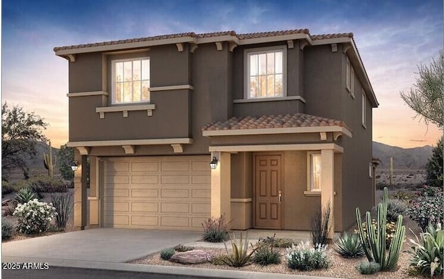 17619 W San Juan Ave, Litchfield Park, AZ 85340 - mediterranean / spanish-style house featuring an attached garage, driveway, stucco siding, and a tiled roof