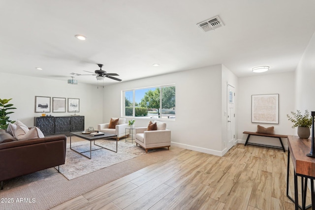 4920 E Osborn Rd, Phoenix, AZ 85018 - living room with light wood-type flooring, recessed lighting, a ceiling fan, and baseboards
