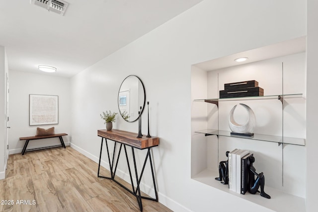 4920 E Osborn Rd, Phoenix, AZ 85018 - hall with light wood-style floors and baseboards
