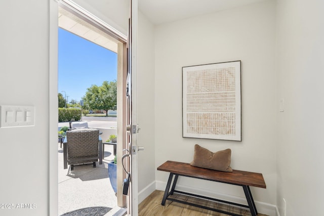 4920 E Osborn Rd, Phoenix, AZ 85018 - entryway featuring baseboards and wood finished floors