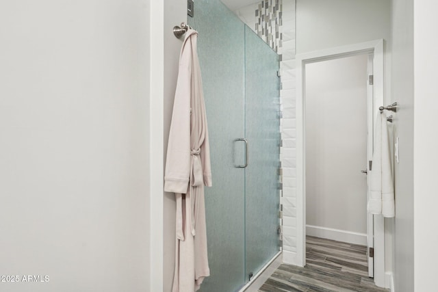 4920 E Osborn Rd, Phoenix, AZ 85018 - full bath with wood finished floors, a stall shower, and baseboards