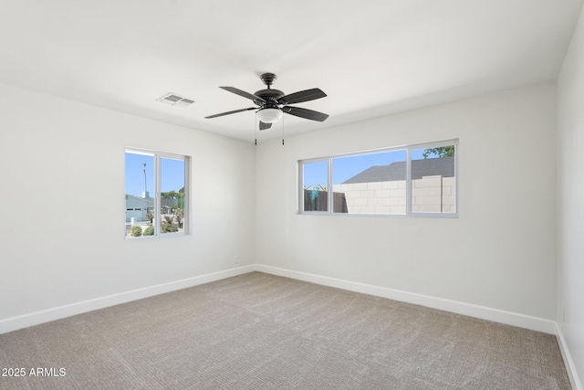 4920 E Osborn Rd, Phoenix, AZ 85018 - carpeted empty room with baseboards and ceiling fan