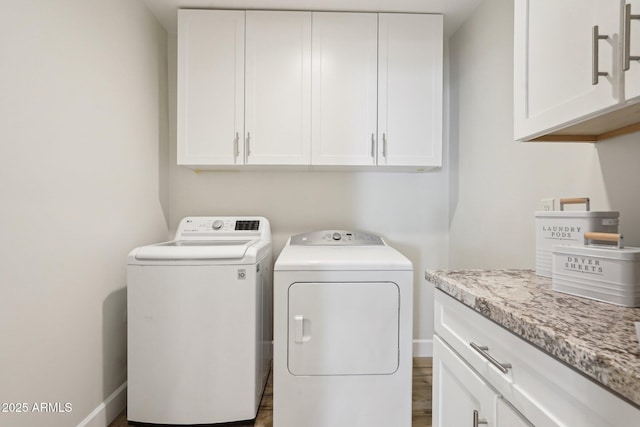 4920 E Osborn Rd, Phoenix, AZ 85018 - laundry room with cabinet space, washer and dryer, and baseboards