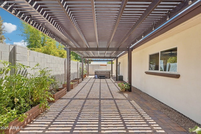 4920 E Osborn Rd, Phoenix, AZ 85018 - fenced backyard with a hot tub, a patio area, and a pergola