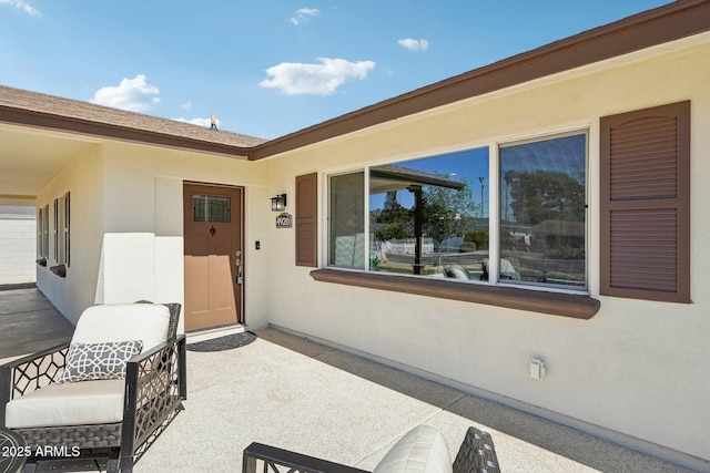4920 E Osborn Rd, Phoenix, AZ 85018 - view of exterior entry with stucco siding
