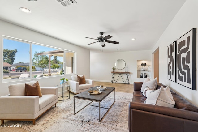 4920 E Osborn Rd, Phoenix, AZ 85018 - living area featuring recessed lighting, baseboards, ceiling fan, and wood finished floors