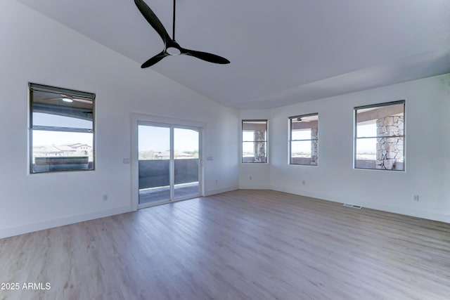 3903 E Melody Dr, Phoenix, AZ 85042 - unfurnished room with ceiling fan, wood finished floors, lofted ceiling, and baseboards