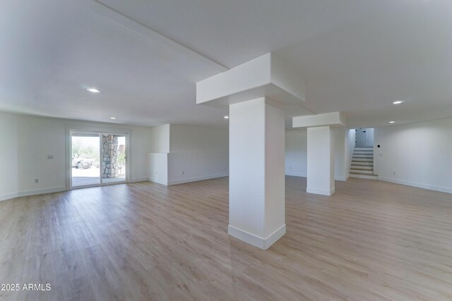 3903 E Melody Dr, Phoenix, AZ 85042 - empty room featuring recessed lighting, light wood-style flooring, stairway, and baseboards