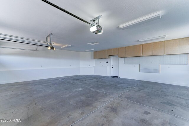 3903 E Melody Dr, Phoenix, AZ 85042 - garage featuring a garage door opener