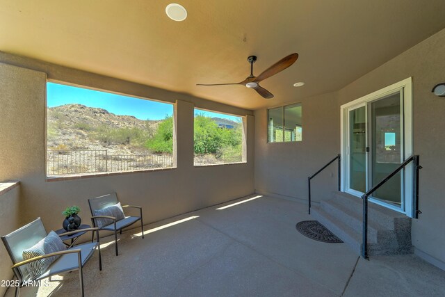 3903 E Melody Dr, Phoenix, AZ 85042 - view of patio featuring a ceiling fan, a mountain view, and entry steps