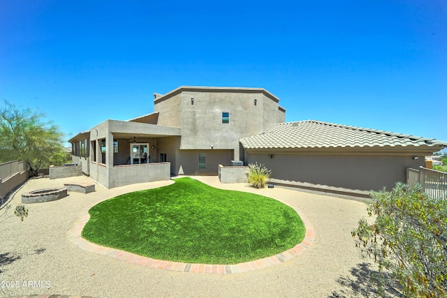 3903 E Melody Dr, Phoenix, AZ 85042 - back of property featuring a fenced backyard, a patio area, and stucco siding
