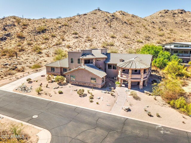 3903 E Melody Dr, Phoenix, AZ 85042 - view from above of property featuring a mountainous background and a desert landscape