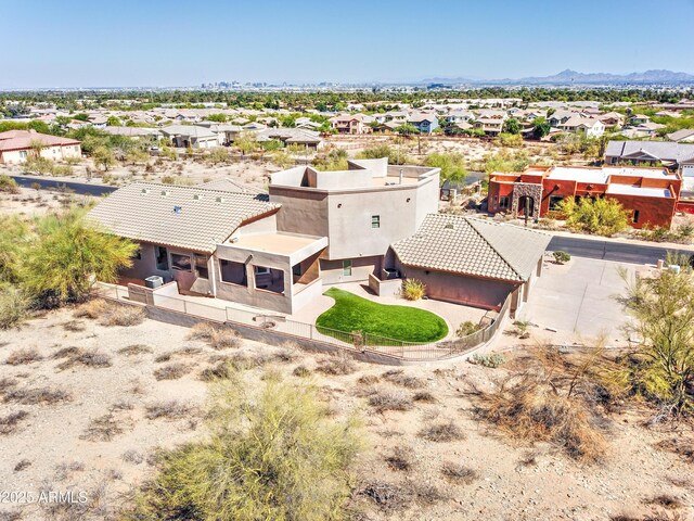 3903 E Melody Dr, Phoenix, AZ 85042 - aerial perspective of suburban area featuring a mountainous background