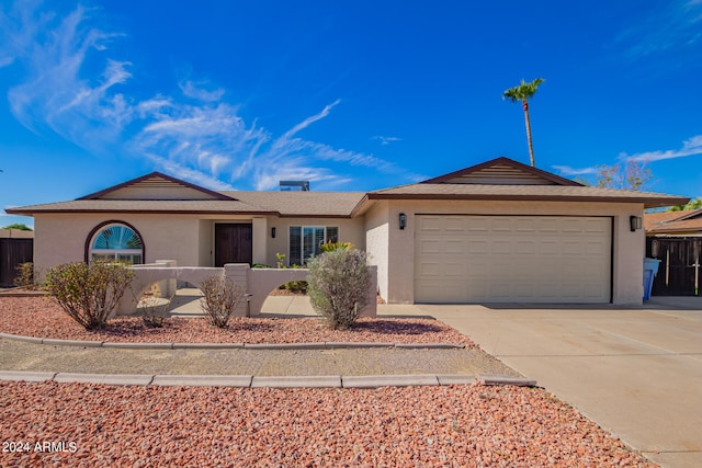 ranch-style home with a garage