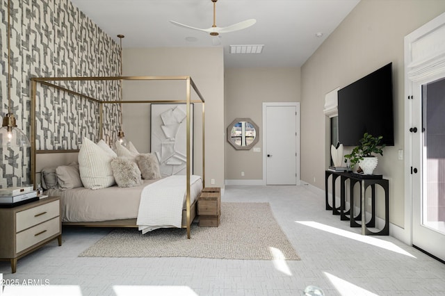 bedroom featuring ceiling fan, visible vents, baseboards, and light colored carpet