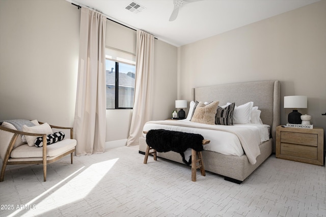 bedroom with ceiling fan, visible vents, and baseboards