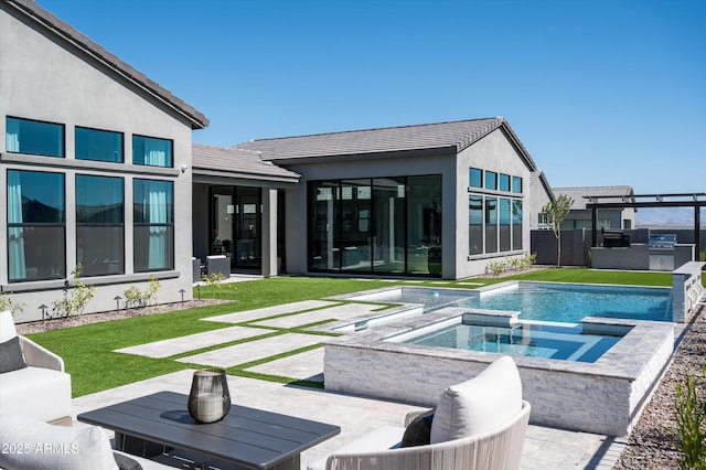 view of pool featuring a patio, grilling area, area for grilling, and a lawn