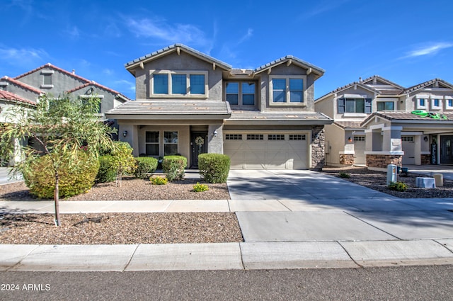 view of front of property with a garage