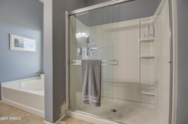 4196 E Bonanza Rd, Gilbert, AZ 85297 - bathroom featuring a garden tub, tile patterned flooring, and a stall shower
