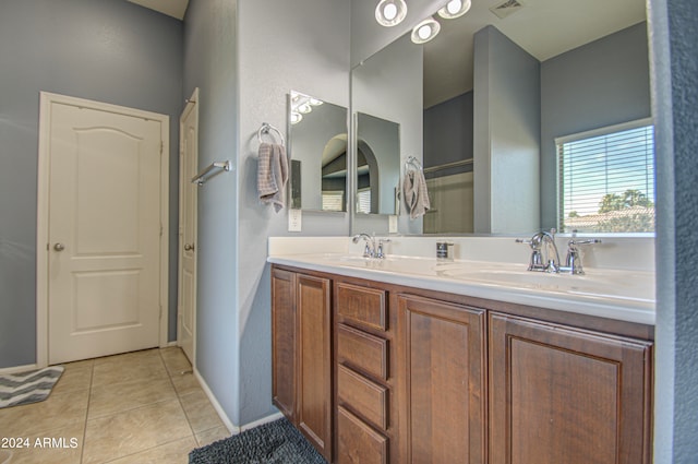 bathroom featuring vanity and tile patterned flooring