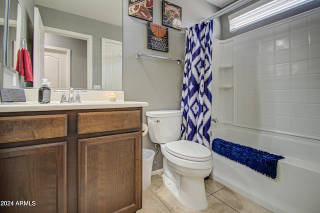 full bathroom with toilet, shower / bath combo with shower curtain, vanity, and tile patterned floors