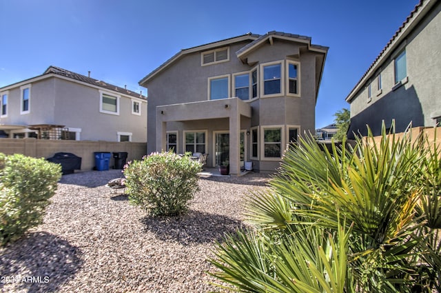 4196 E Bonanza Rd, Gilbert, AZ 85297 - back of property featuring stucco siding, fence, and a patio