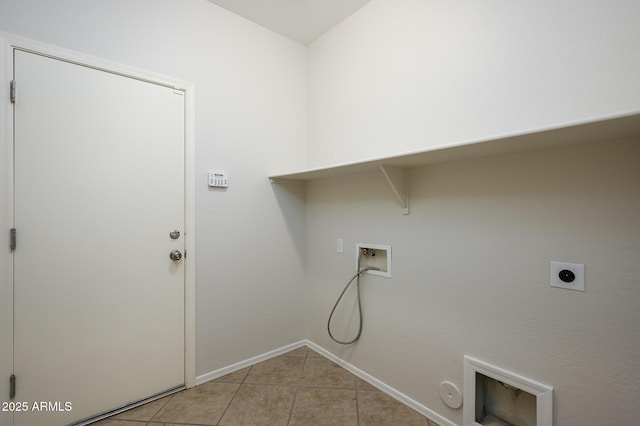 laundry area featuring hookup for an electric dryer, washer hookup, gas dryer hookup, and light tile patterned flooring