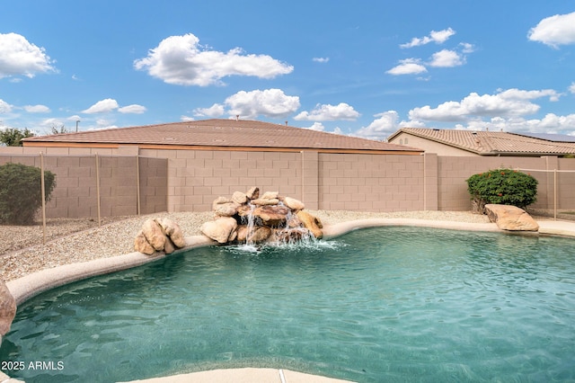 view of pool featuring a fenced in pool and a fenced backyard