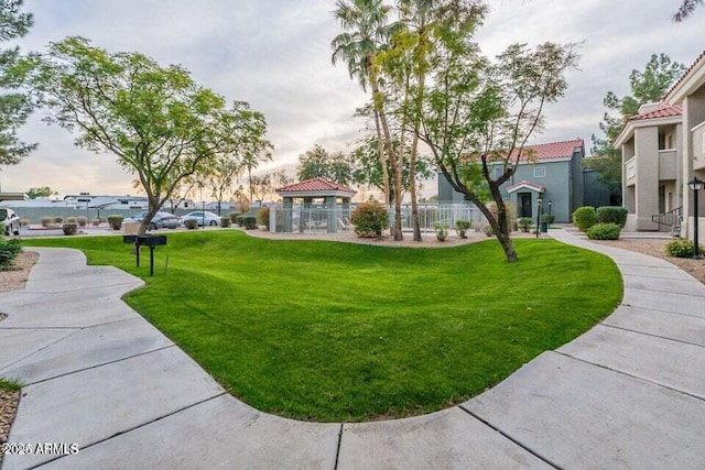 view of community featuring a yard