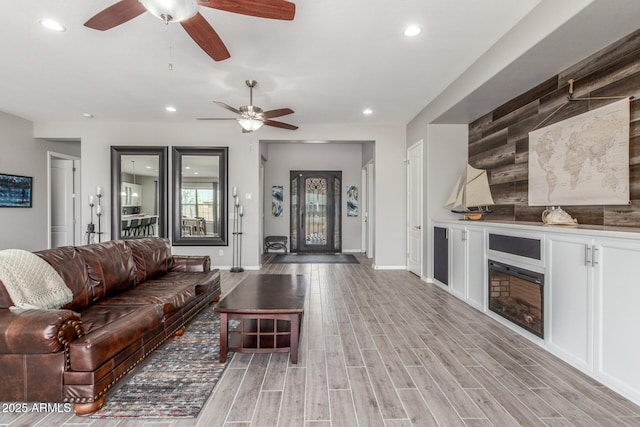 1342 E Milada Dr, Phoenix, AZ 85042 - living area with ceiling fan, recessed lighting, light wood-style floors, and baseboards