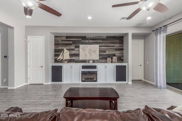 1342 E Milada Dr, Phoenix, AZ 85042 - living room with ceiling fan, light wood-type flooring, baseboards, and recessed lighting