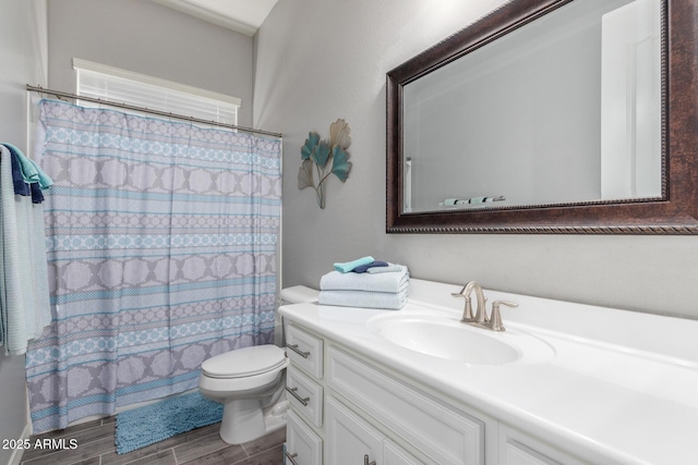 1342 E Milada Dr, Phoenix, AZ 85042 - bathroom with vanity, toilet, wood finished floors, and curtained shower