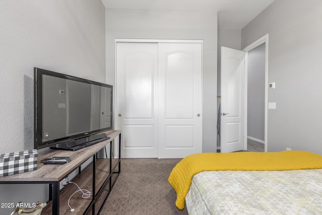 1342 E Milada Dr, Phoenix, AZ 85042 - bedroom featuring a closet, carpet, and baseboards