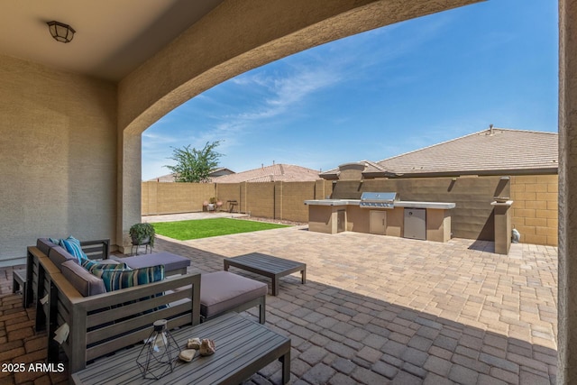 1342 E Milada Dr, Phoenix, AZ 85042 - fenced backyard with a patio area and an outdoor living space