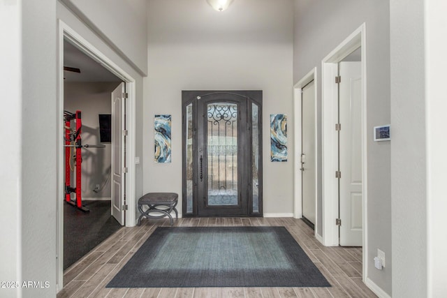 1342 E Milada Dr, Phoenix, AZ 85042 - entryway featuring wood tiled floors and baseboards