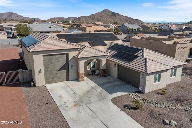 drone / aerial view with a residential view and a mountain view